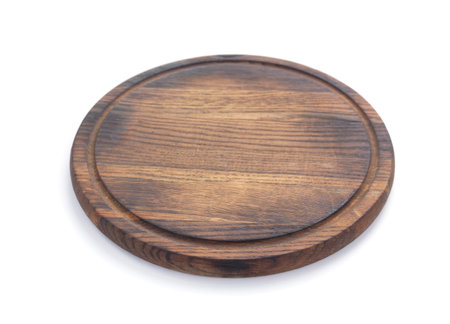 Wood cutting board isolated on white background. Wooden pizza boardの写真素材