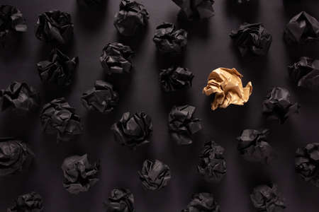 Crumpled paper balls at black background texture. Inspiration creative idea conceptの写真素材