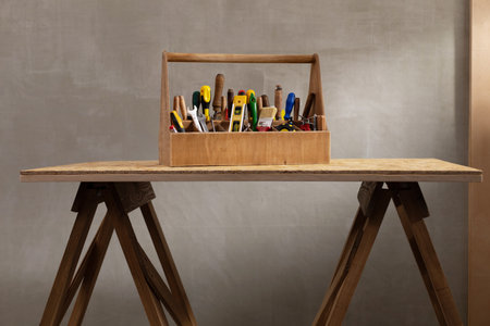 Construction tools and toolbox on wooden table background texture. Tools kit and tool boxの写真素材