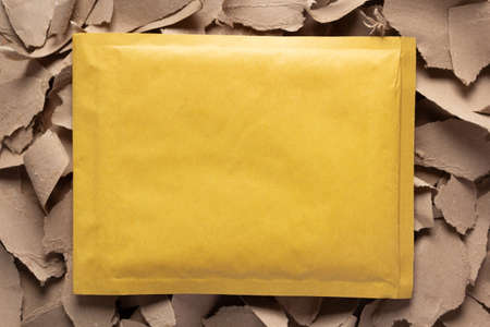 Paper package at  paper torn background texture. Recycling conceptの写真素材