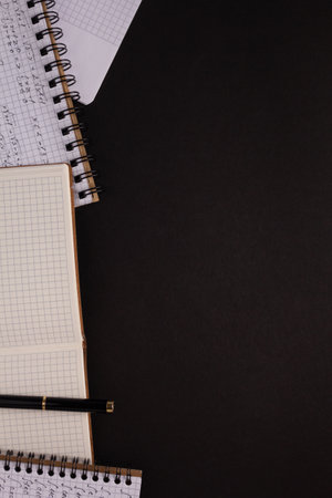 Paper notebook at black background texture. Creative idea conceptの写真素材