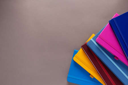 Paper notebook or notepad at grey background texture. Creative idea conceptの写真素材