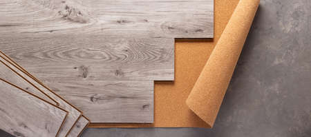 Wood laminate background at floor texture. Wooden laminate heap top viewの写真素材