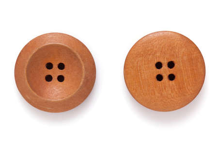 Button isolated at white  background. Wooden buttons closeup