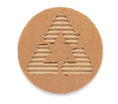 Recycle symbol and cardboard waste paper isolated at white background texture. Recycling concept and brown paperの写真素材