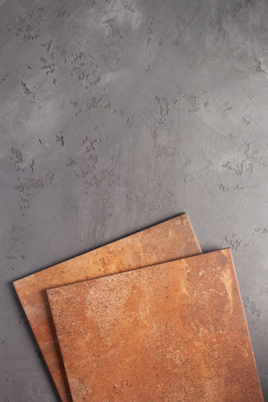 Tile on cement floor background texture. Concrete wall and tiles with copy spaceの写真素材