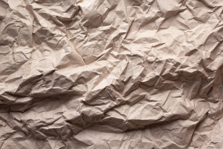 Crumpled parcel paper background texture with copy spaceの写真素材