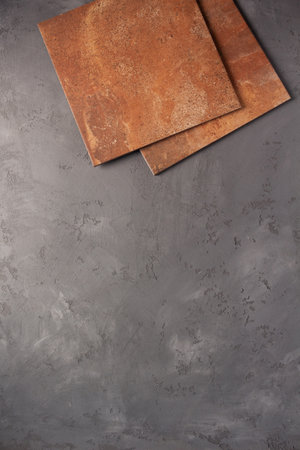 Tile on cement floor background texture. Concrete wall and tiles with copy space