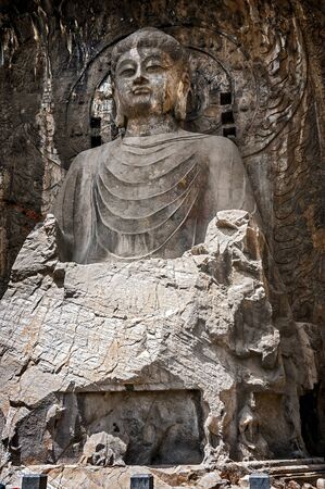 Carved Buddha images at Longmen Caves, Dragon Gate Grottoes, dating from the 6th to 8th Centuries, , Henan Province, China, Asia.の写真素材