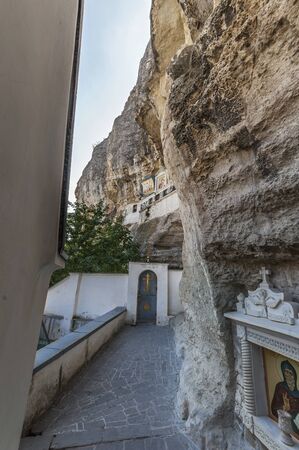 Entrance to the Church of the Assumption . Above the temple on the rock icon of the Mother of God .の写真素材