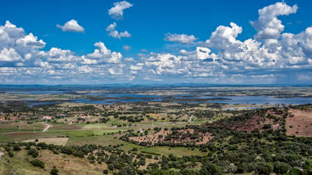 Portugal, the District of Evora. Monsaraz. From the castle walls overlooking the small town cemetery and then to neighboring Spain and Guadianu River, a natural border of Spain .の写真素材