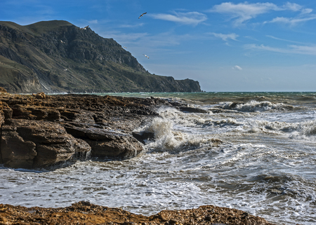Russia, peninsula of Crimea, near Sudak. A small rough sea at Cape Frenchwoman.の写真素材