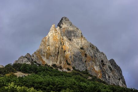 Russia, peninsula of Crimea, village of Sun Valley. Picturesque rocks around the village on a background of the autumn sky.の写真素材
