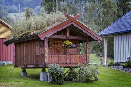 Norway, early in the morning in a small village on the banks of Neroyfiord , fog in the mountains . Wooden bath .のeditorial素材