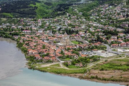 Georgia. View from the walls of the monastery Jvari on the merger of the Kura and Aragvi and the ancient town of Mtskheta, the first capital of Georgia.の写真素材