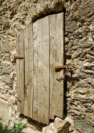 Spain, Catalonia . Rupit - mountain village , built on top of the basalt rocks; details of facades of the fourteenth to sixteenth centuries.の写真素材