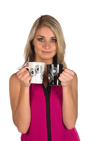 Young woman holding two cupsの写真素材