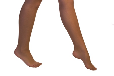 Young female legs in stockings and high heelsの写真素材