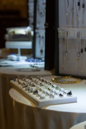 A collection of non designer jewellery displayed in a mobile exhibition 