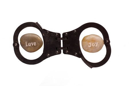 Abstract concept of  external influences limiting our love and joy in lifeの写真素材