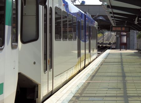 Close up view of light rail train arriving at Sunset Transit Center, Beaverton, Oregon. 