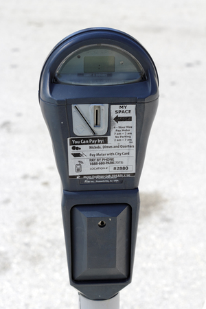 FORT LAUDERDALE, FLORIDA - FEBRUARY 3  One gray metal outdoor urban public parking meter that you pay for parking by coins, city card or pay by phone on February 3, 2013 in Ft Lauderdale, Florida のeditorial素材