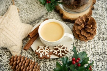 Morning coffee in a cup. Christmas composition. Cup of coffee, anise star, christmas cookies. top viewの写真素材