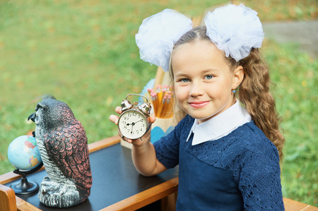 Portrait of beautiful young first-grader Farewell Bell. day of knowledge. beginning of the school...