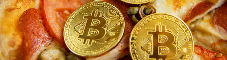 Bitcoin Pizza Day 22 May. concept of buying pizza with bitcoin. cryptocommunity holiday. copy space....