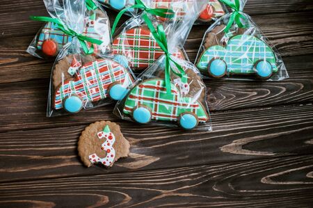 gingerbread cookie in the form of machines on wood background. Car cookies. Auto industry Christmas business cardの写真素材