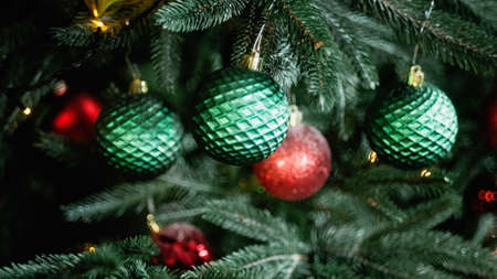 Defocused christmas abstract blurred background. Christmas magic composition with pine, bells and...