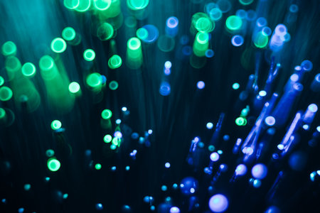 sparkling abstract bokeh background neon color with glitter circles defocused particles on dark background for overlay screen. Abstract Festive lights defocused.の写真素材
