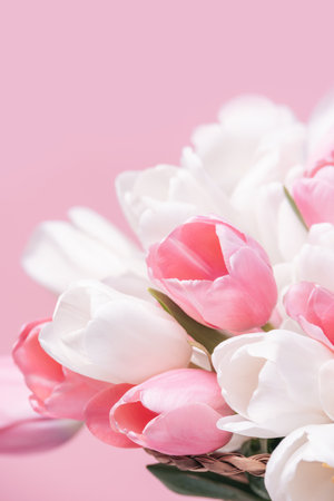 greeting card for spring holiday Happy mothers day composition. Beautiful background of bouquet of pink and white tulips. perfect for romantic themes, wedding invitations, and feminine branding.の写真素材