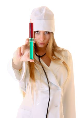 Young nurse with syringe isolated on whiteの写真素材