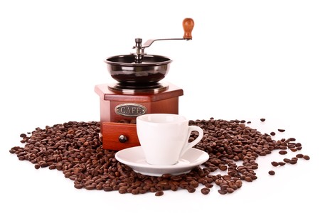Coffee Grinder and cup isolated on whiteの写真素材