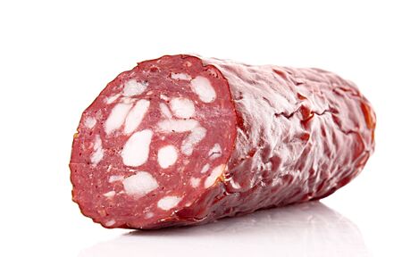 Smoked sausage isolated on whiteの写真素材