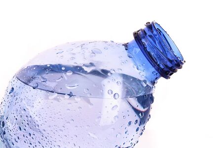 Sparkling water with drops isolated on white