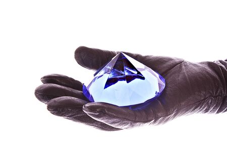 Hain in glove with blue diamond isolated on whiteの写真素材