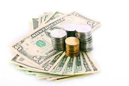American dollars and Ukrainian coins isolated on white
