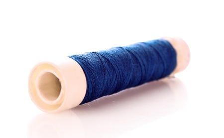 blue bobbin thread isolated on white