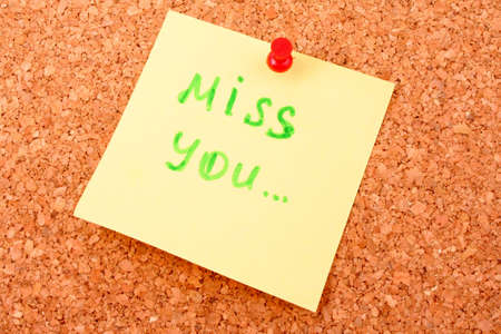 Sticker on cork board with textの写真素材