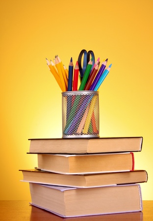 Stationery and books  on red backgroundの写真素材