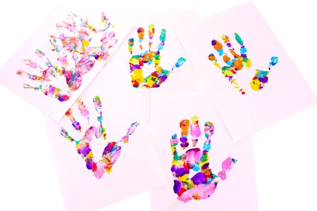 Colored hand print on whiteの写真素材