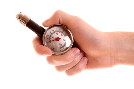 Plastic tyre-pressure gauge isolated on whiteの写真素材