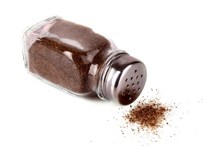 pepper shaker isolated on whiteの写真素材