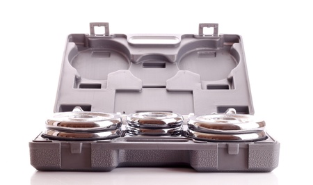 Disassembled dumbbells in box isolated on whiteの写真素材