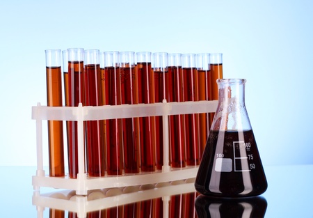 Test tubes closeup on blue backgroundの写真素材