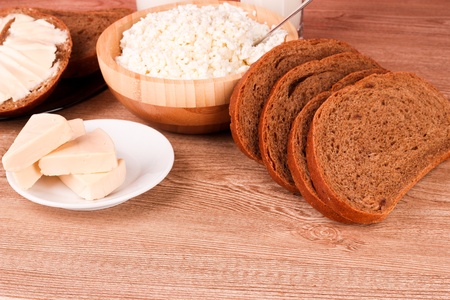 Diary products on wooden tableの写真素材