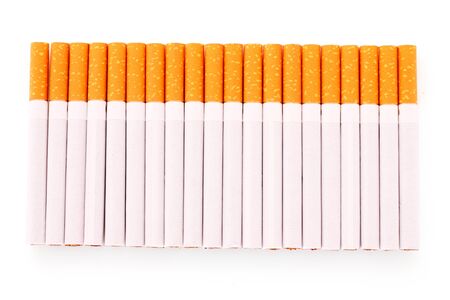 Many cigarettes isolated on whiteの写真素材