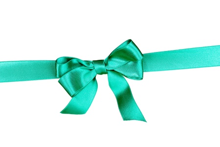 Green  ribbon and bow isolated on white backgroundの写真素材